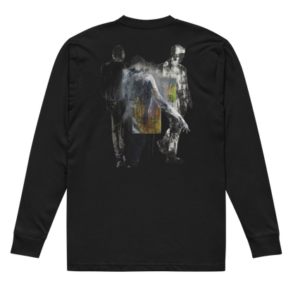 A black long-sleeve t-shirt shown from the back, featuring a large graphic print of three stylized, semi-transparent figures in white, gray, and black, with a small colorful square detail in the center.