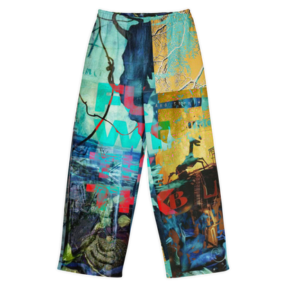 A pair of wide-leg pants featuring a highly detailed, multicolor graffiti and street art print with blue, yellow, red, and black elements, shown against a plain white background.