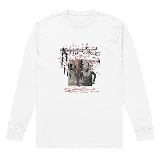 A white long-sleeve crewneck t-shirt with a complex graphic print on the front. The graphic features a black and white photograph of a shirtless man, overlaid with red scribbled lines and black silhouettes of people against a truss structure.