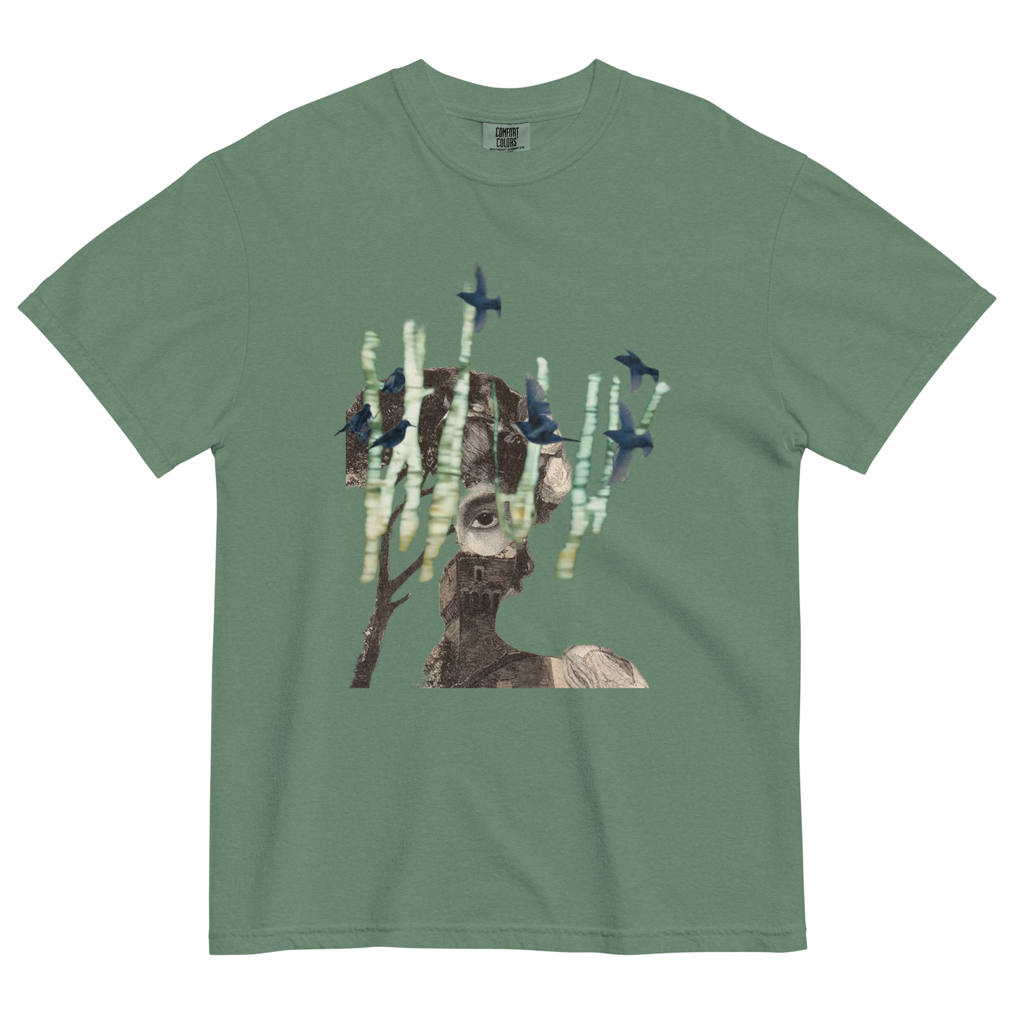 Green t-shirt with a graphic design of a person with trees and birds on a white background